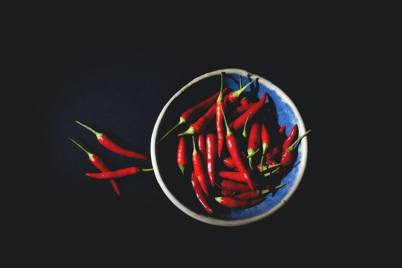 "The Fiery Allure of the 'One Chip Challenge': Unveiling the Mystery Behind the Daring Peppers"spicyfood,hotpeppers,foodchallenges,OneChipChallenge,mystery,daring,fieryallure